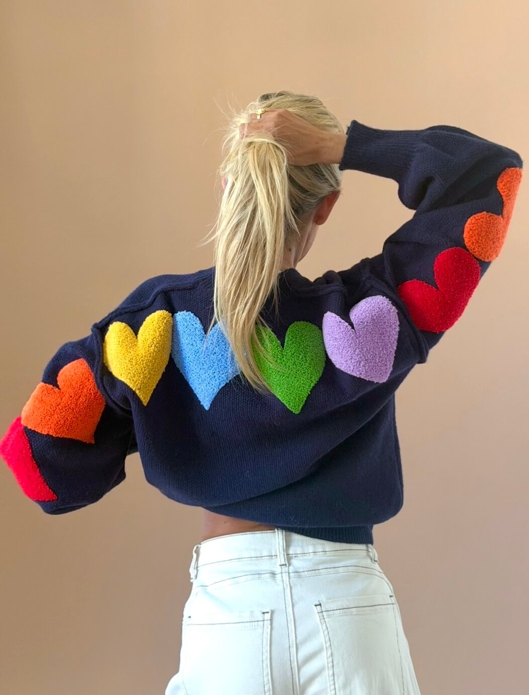 EF0CF4A0-B1B9-4658-AA68-45F9C618AE03 Colorful Hearts Sweater – Blue - Image 1